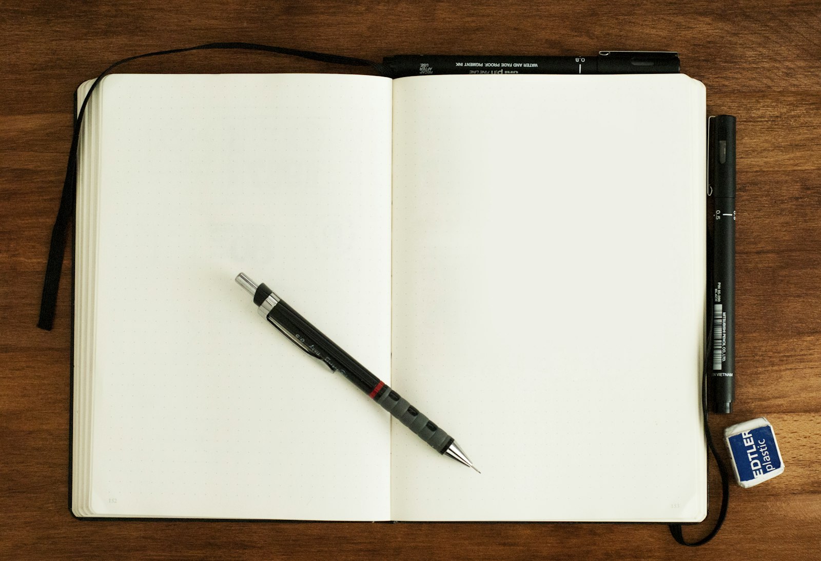 Pen resting on a blank journal – recovery journaling tools